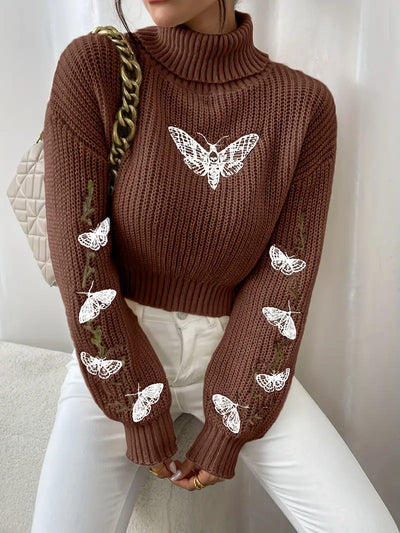 Alma - Pull à col roulé avec motif papillon