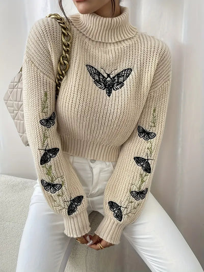 Alma - Pull à col roulé avec motif papillon