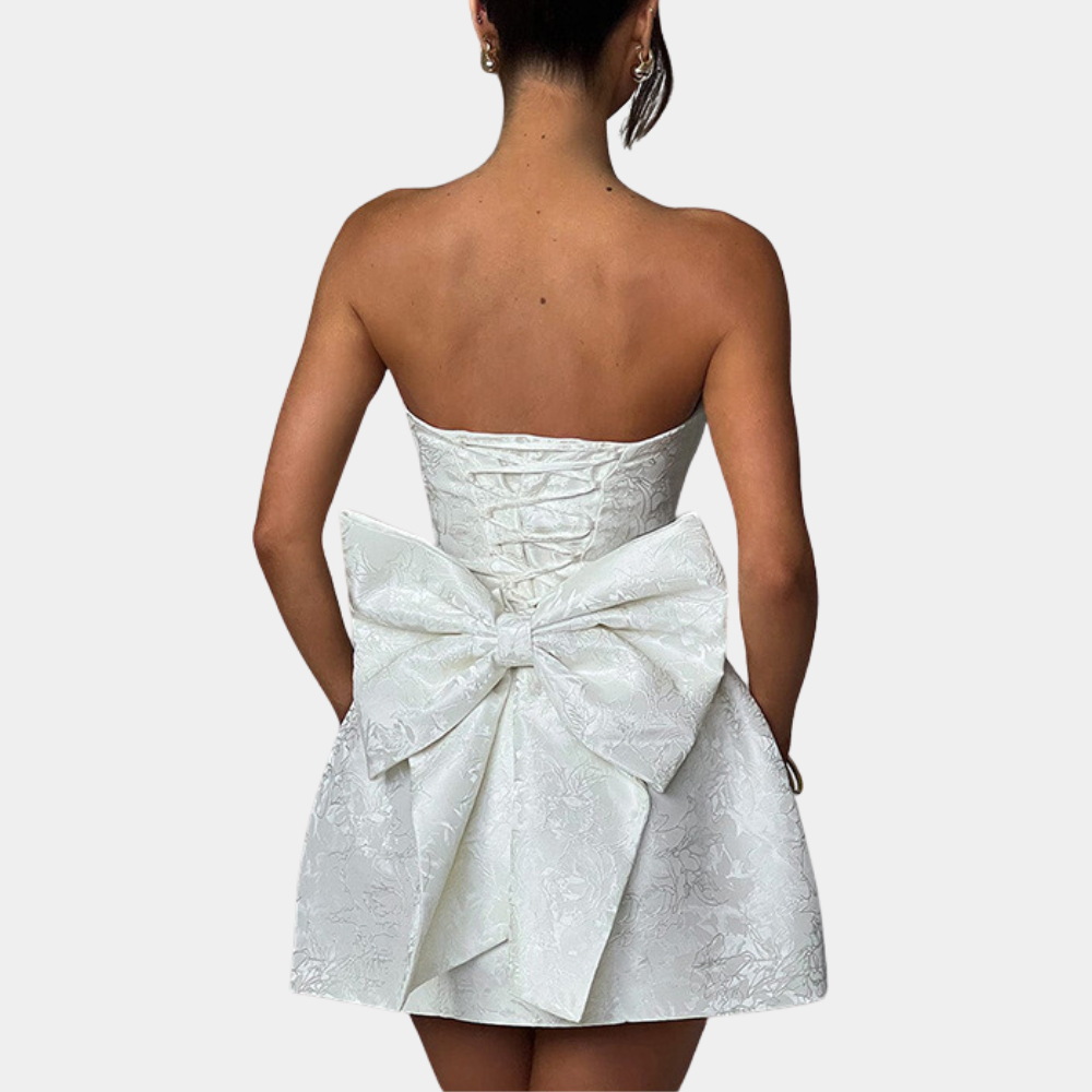 Amelia - Mini robe élégante pour femme avec nœud dans le dos